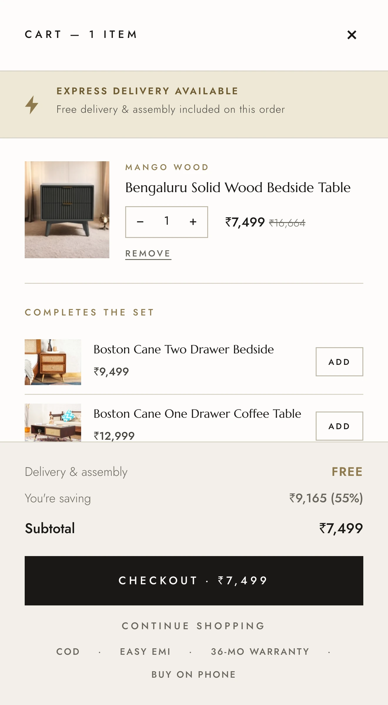 The cart drawer, showing the item with a quantity stepper, two suggested additions, the saving, and a full-width checkout button.