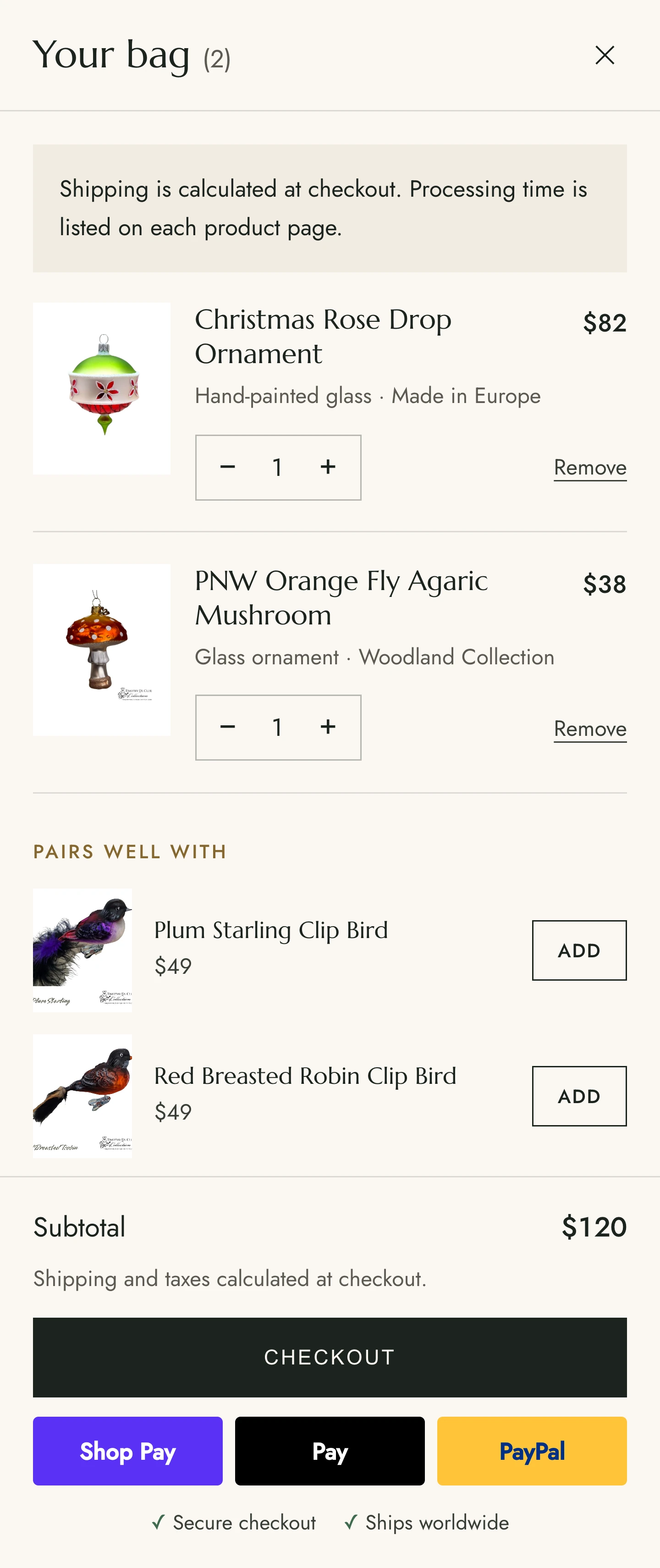 The bag drawer: two line items with quantity steppers, a subtotal, a checkout button and the wallet buttons.